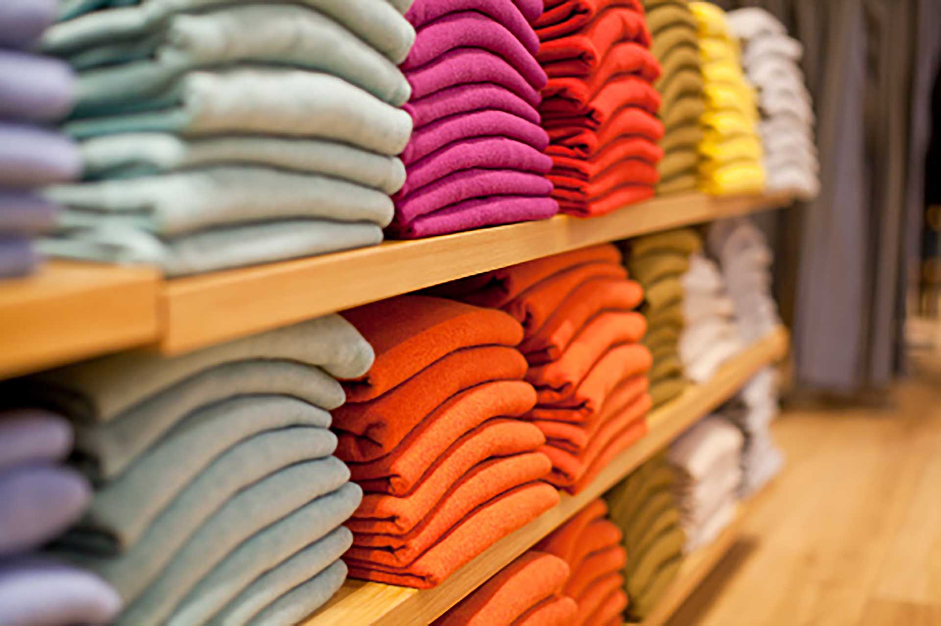 Up close picture of an organized sales tables with shirts